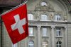 Швейцарські банки почали закривати рахунки росіян
